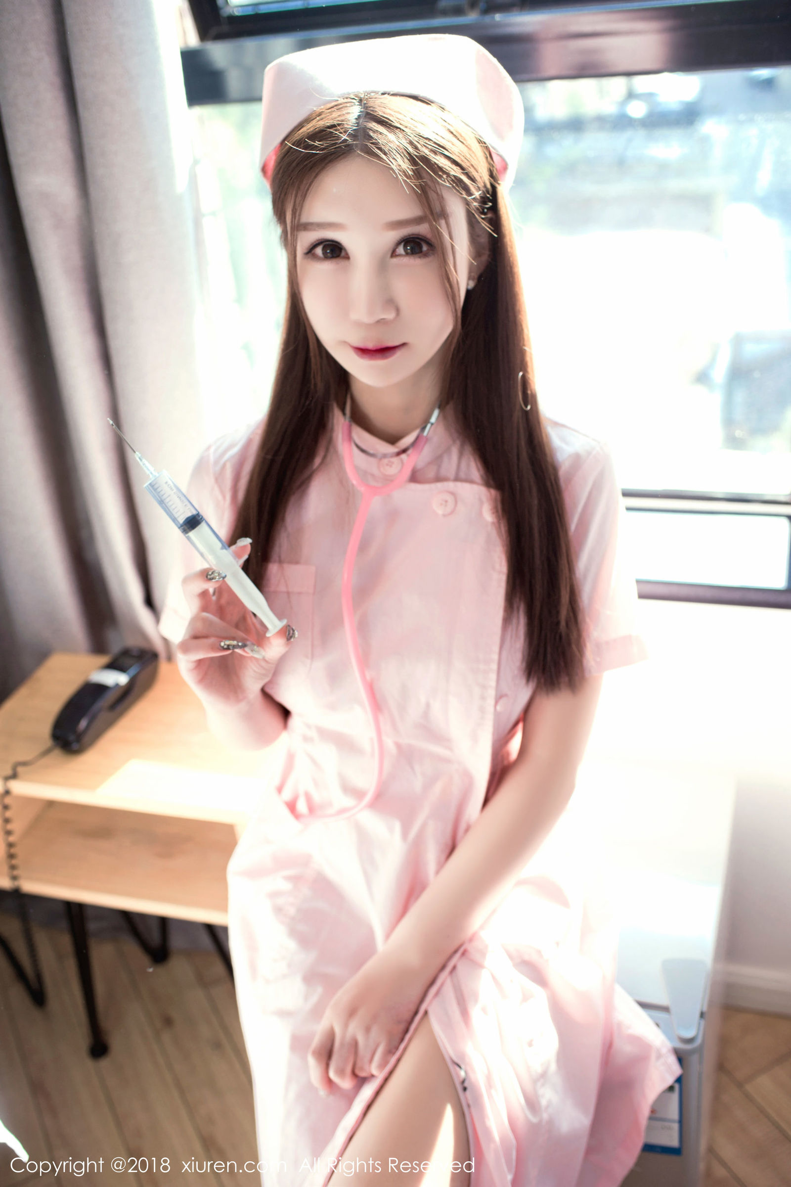 taotuhome[XiuRen秀人] No.1245 李宓儿 - 粉色护士服和黑色绑带内衣丝袜第2张